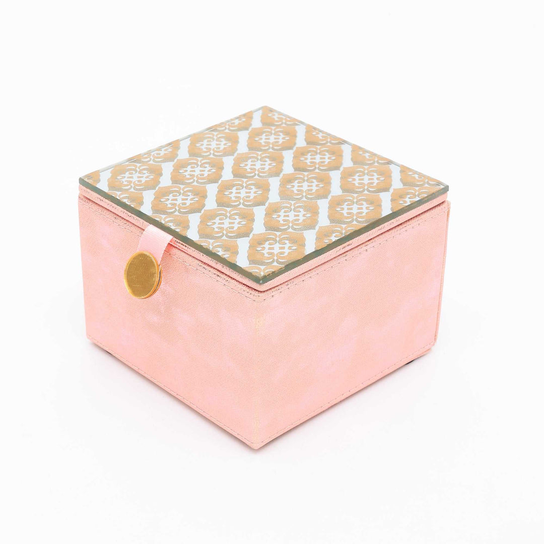 Trendy Pink Box with Gold Accents and Bold Patterns for Storage