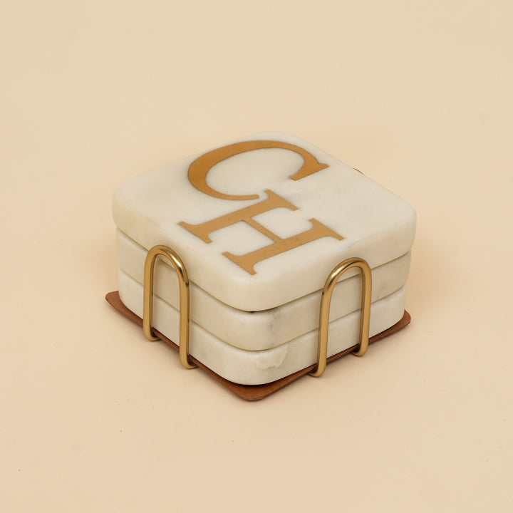 Marble coaster set with brass inlay