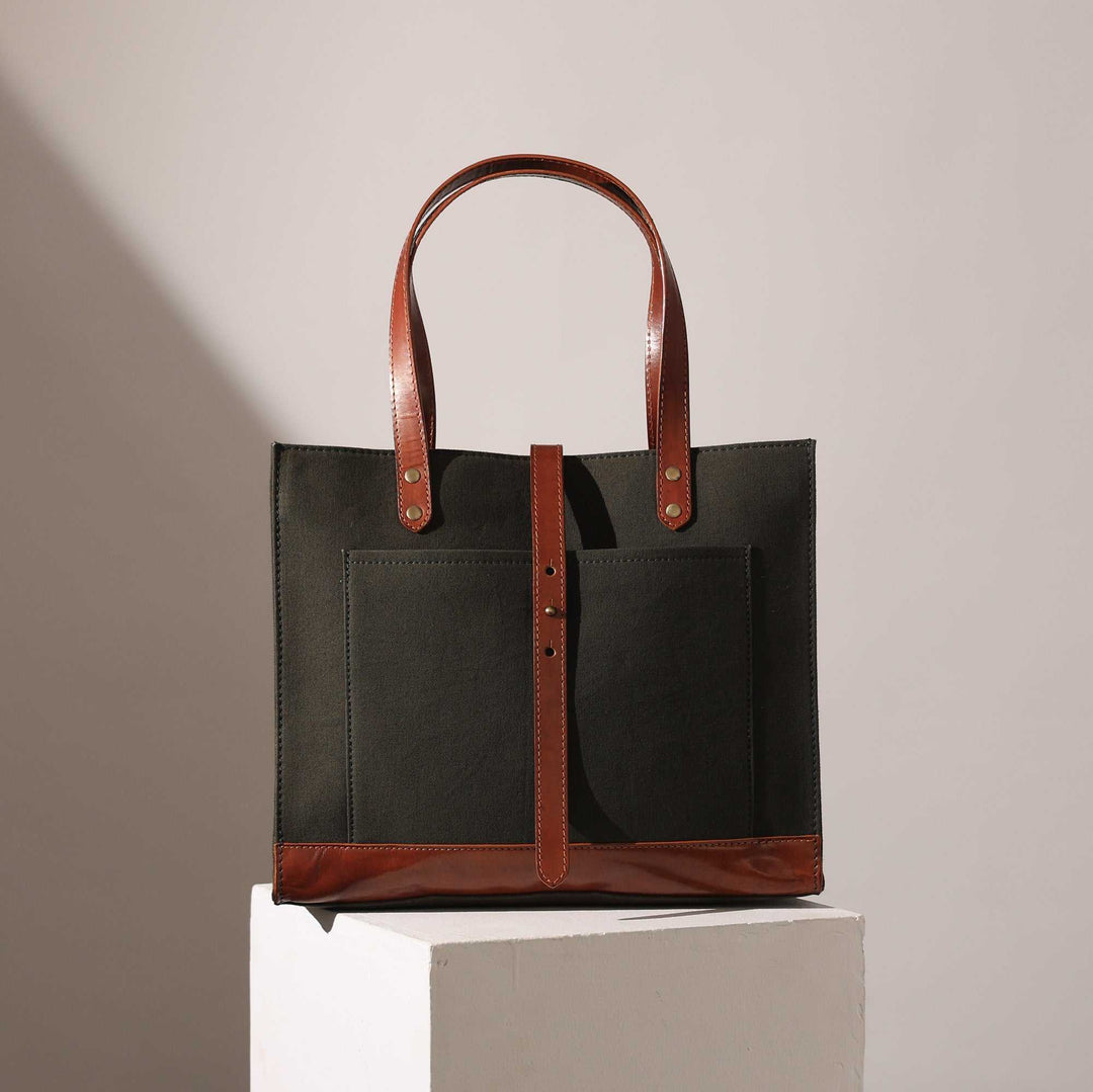 Dark Brown Handbag with Pinned Closure for Stylish Everyday Use