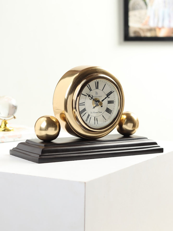 Expobazaar Orbitron table clock in gold