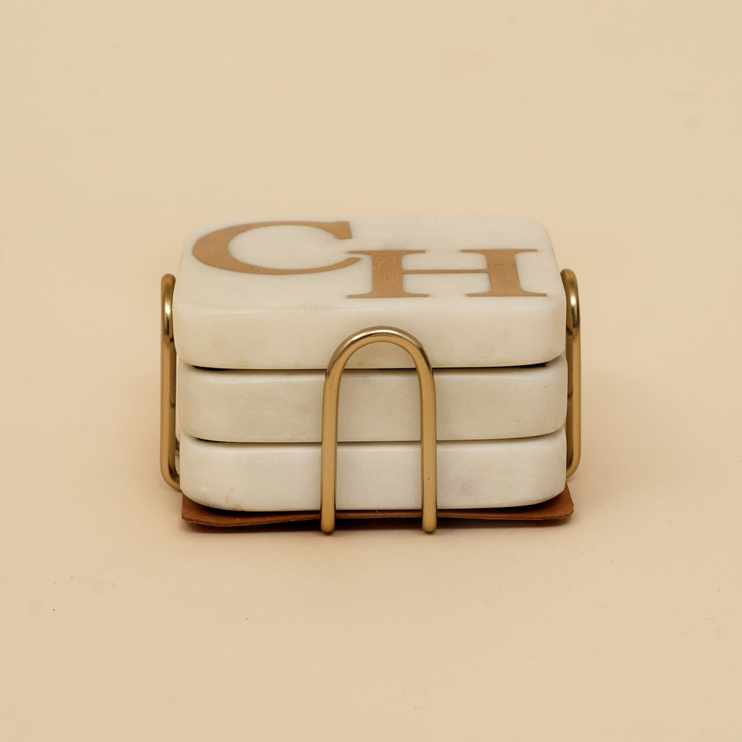 Marble coaster set with brass inlay