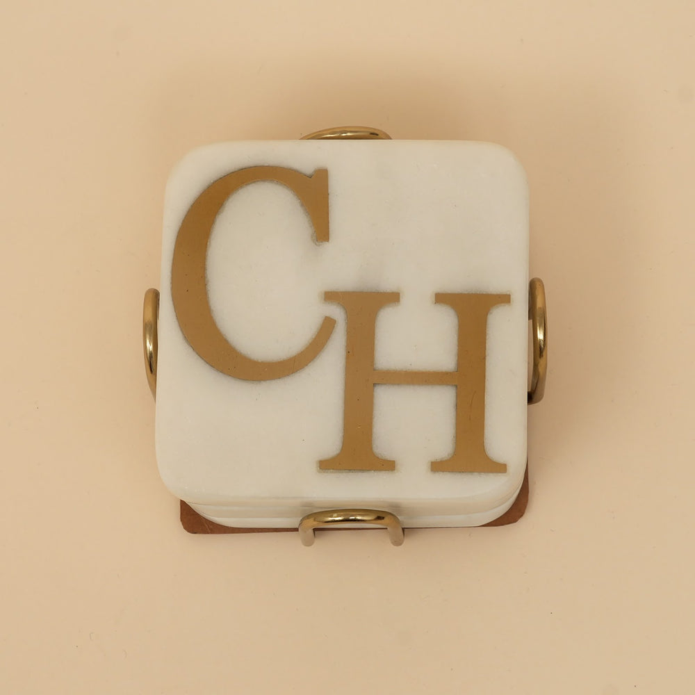 Marble coaster set with brass inlay