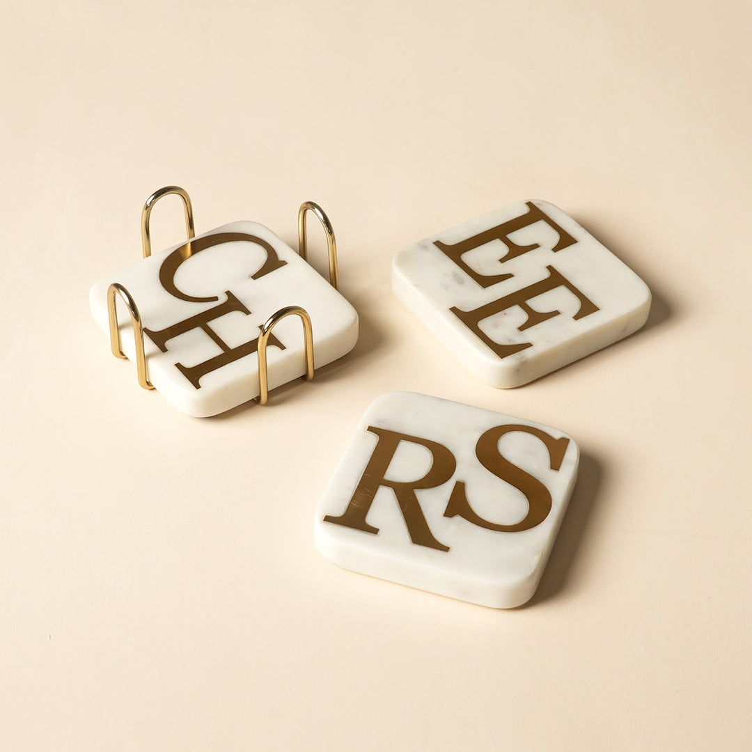 Marble coaster set with brass inlay