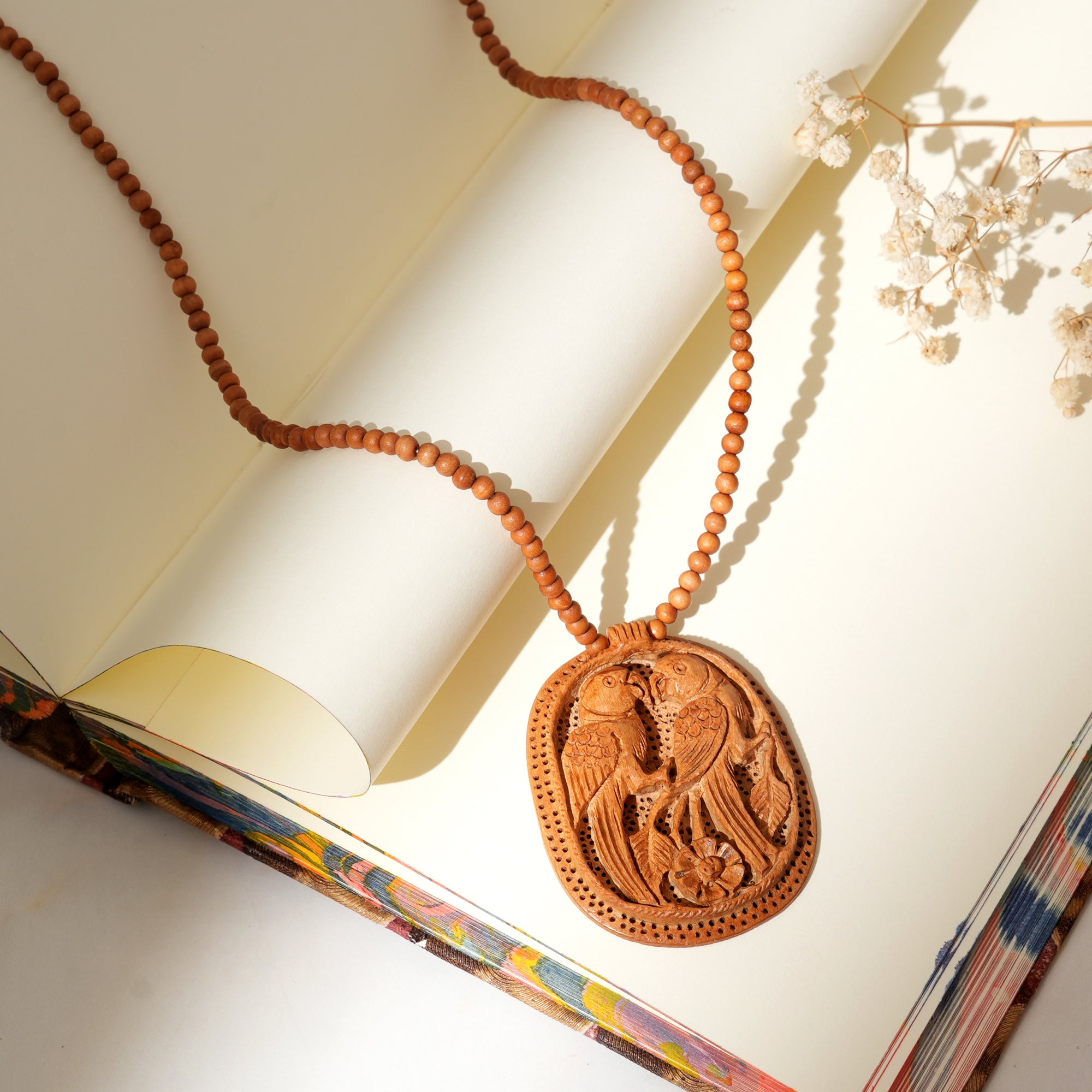 Handcrafted Wooden Two Parrots Pendant with Floral Carving