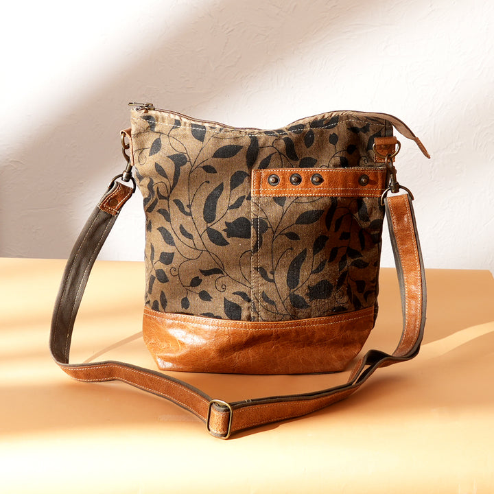 Canvas Leaf Print Sling Bag – Stylish Daily Wear with Tan Leather Straps